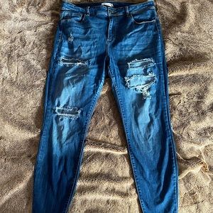 Plus size distressed high rise skinny jeans